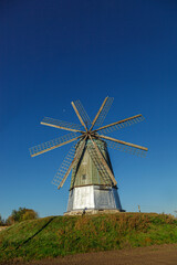 windmill dutch type against blue sky