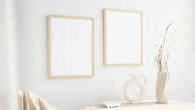 Video two wooden frames mockup 3x4 on wall 