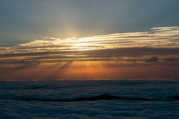 sunset over the clouds