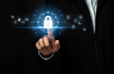 Obraz premium Young businessman select the icon security on the virtual display, Businessman technology privacy. Cyber security business data protection concept.