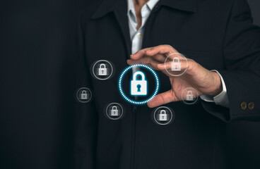 Businessman select the icon security on the virtual screen, Businessman technology privacy. Cyber security business data protection  concept.