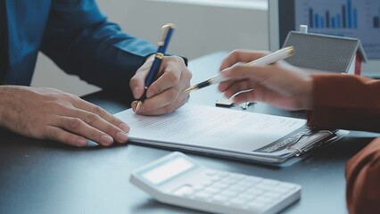 Signing home sales and insurance contracts with real estate agents, signing contracts to know the terms of buying and selling homes and real estate, contract signing ideas.