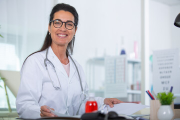 woman doctor smiling and looking to the camera