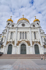 Facade Cathedral of Christ Savior in Moscow against cloudy sky.