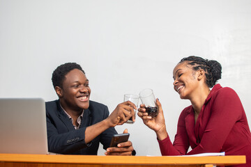 african business colleague make a toast in the office