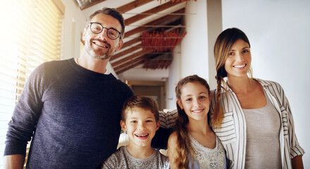 Portrait, children and parents as a homeowner family moving house for a new start after real estate...