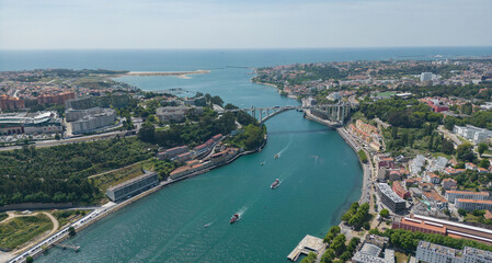 Aerial view of the Douro River in Porto. Aerial drone view of the city of Porto in Lisbon, the...