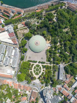 aerial photography of the Palace Garden Tower in Porto, Lisbon. In the image you can see the superbook arena, a park full of trees and the beautiful gardens