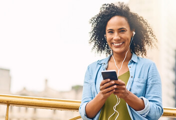 Happy, music and portrait of woman in city with phone listening to track, audio and mockup in urban town. Traveling, smile and beautiful African female person streaming radio for relaxing on weekend