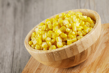 Close up of a wooden bowl of delicious Sweet Corn