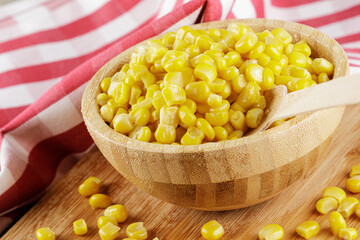 Close up of a wooden bowl of delicious Sweet Corn