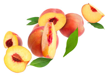 Cut and whole fresh ripe peaches with green leaves falling on white background