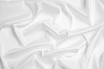 Obraz premium White silk fabric as background, top view