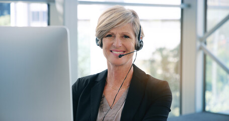 Portrait, call center and mature woman with a smile, telemarketing and customer service. Face,...