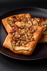 Delicious fresh sweet pie or pizza with pear, brie cheese, honey and nuts