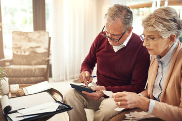 Finance, calculator and budget with an old couple in their home for retirement or pension planning....