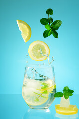 glass of water with lemon and mint