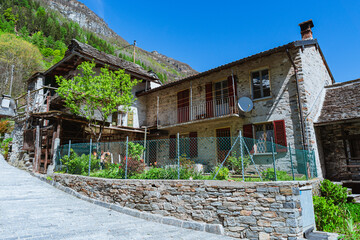 The small characteristic village of Sonogno, the highest town of Val Verzasca, in Canton Ticino, Switzerland - May 2023
