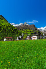 Fototapeta na wymiar The small characteristic village of Sonogno, the highest town of Val Verzasca, in Canton Ticino, Switzerland - May 2023