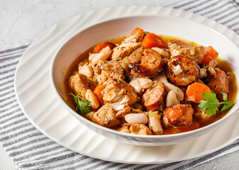 french cassoulet of chicken, sausages, white beans