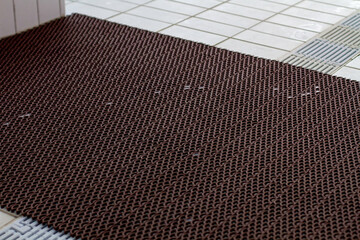 Anti-slip mat on the tile in the pool. - obrazy, fototapety, plakaty