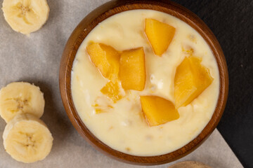 natural yogurt with pieces of fruit and banana flavor