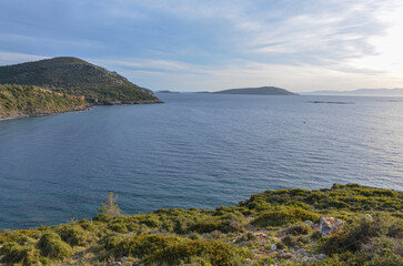 scenic view of Tuzla Bay and Kara Ada island on Turkish Aegean coast near Kucukbahce (Karaburun, Izmir province, Turkiye)