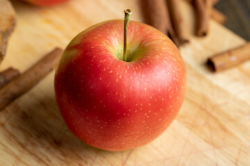Fresh red and green apples on the kitchen table