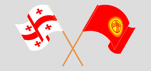 Crossed and waving flags of Georgia and Kyrgyzstan