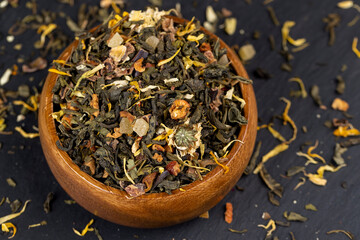 Fototapeta premium fresh green tea with pieces of fruit and berries