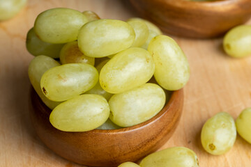 Harvested green grapes on the table