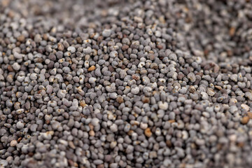 a close-up of a pile of poppy seeds used in cooking