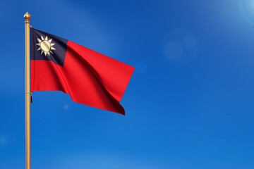 Taiwan. Flag blown by the wind with blue sky in the background.