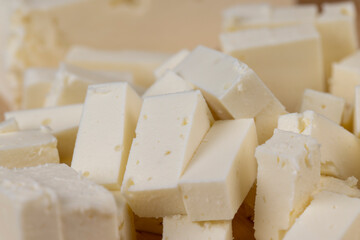 sliced soft cheese that is used for salads