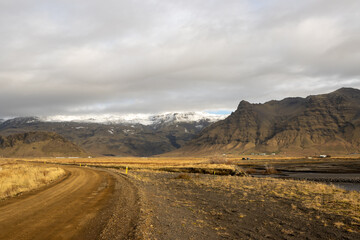 Fototapeta na wymiar Country and mountains with snow, Iceland