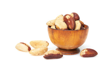 Bertholletia brazil nuts in bowl on a white