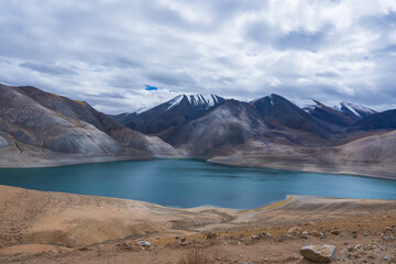 The Mirpal lake is between the mountains. This lake is located on the way from Pangong Lake to Tso Moriri, Ladakh, India - obrazy, fototapety, plakaty