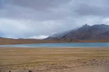 the road,  the mountain, and Tso Kar lake, Beautiful scenery along the way at Ladakh, India