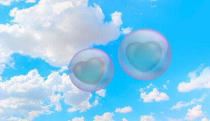 A pair of hearts in two soap bubbles