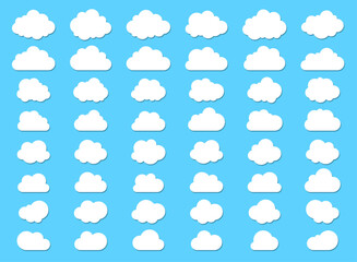 Fototapeta premium Big set of clouds with shadow. Fluffy clouds with flat bottom collections in flat style isolated on blue background.