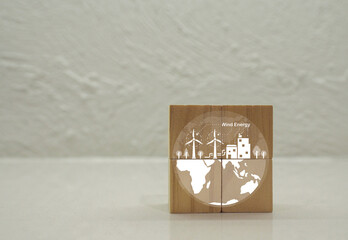 Reduce global warming with natural energy, environmentally friendly renewable energy. on a wooden cube