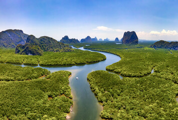 Drone view of the mangrove forests and towering limestone pinnacles and karst landscape of Phangnga Bay, Thailand
