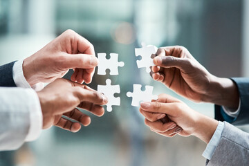 Puzzle, hands and group of people for solution, teamwork and goals, achievement and workflow success. Team building, games and development of woman and staff problem solving, synergy or collaboration - obrazy, fototapety, plakaty