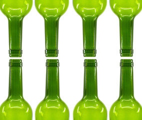 Rows of empty wine bottles isolated on a plain white background. Copy space. Alcohol consumption...