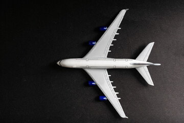 Model plane, airplane on dark background.