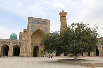 Architectural ensemble Po-i Kalyan in Bukhara, Uzbekistan. Kalyan minaret and mosque courtyard.
