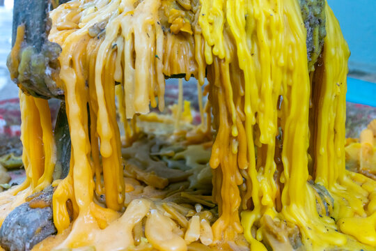 mix of orange and yellow candle dripping