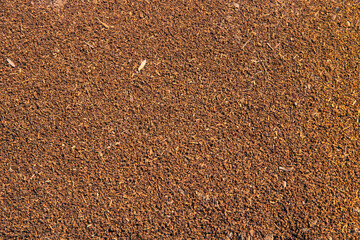 brown textured background of wood sawdust
