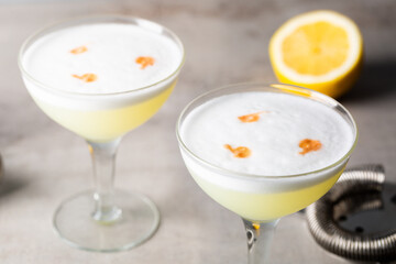 Pisco Sour Cocktail booze pisco, fresh lemon juice, syrup, egg white and aromatic bitters