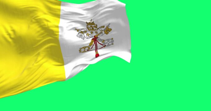 Flag of Vatican City waving isolated on a green background